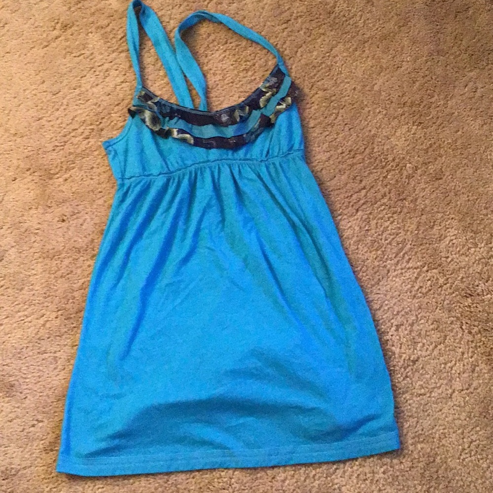 Blue cami with floral design at the top